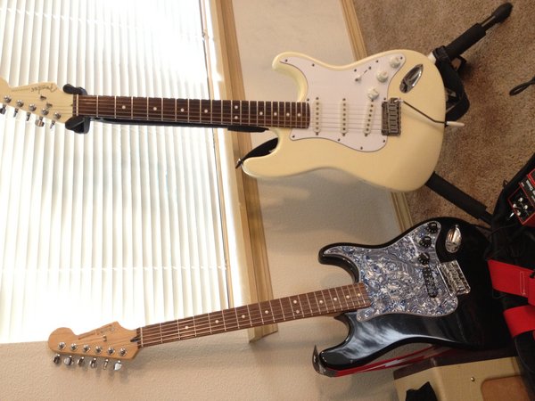 Squier Bullet with a Fender neck and Seymour Duncan JB Jr. Neck humbucker in the bridge. My super fucking awesome Fender American Standard Limited Strat (best Strat I've ever played)