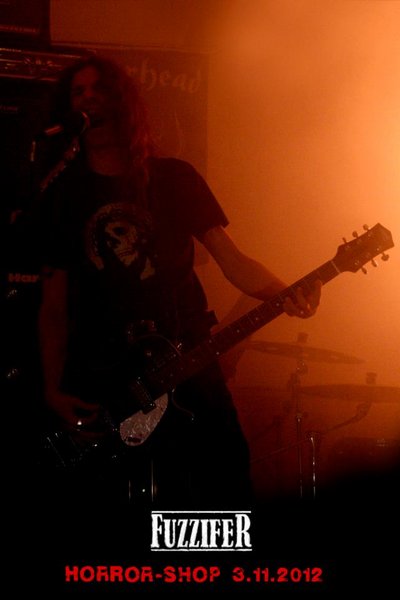 fuzzifer spreading the gospel at horror shop.jpg