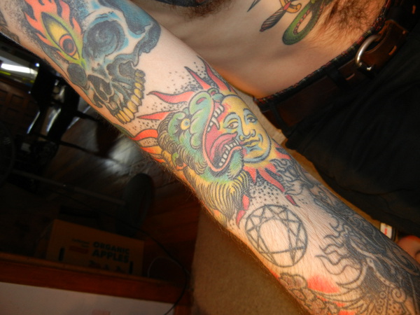 skull and lion tattoo.jpg