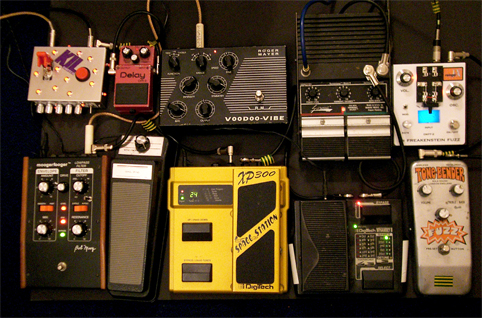 Boss CS2 compressor (not in shot) &gt; Colorsound Tonebender &gt; Rainger FX Dr Freakenstein Fuzz &gt; Digitech Whammy II &gt; Maniac Music Sustainiac &gt; Digitech Space Station &gt; Roger Mayer Voodoo Vibe &gt; Moogerfooger lo-pass filter (with cut-off pedal) &gt; Boss DM2 delay &gt; KIL Switch...