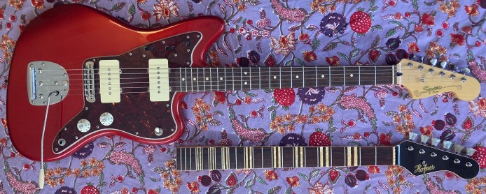 note difference in fingerboard length.